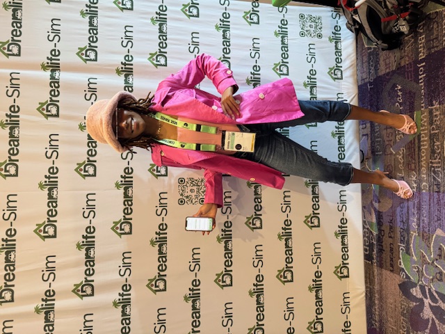 SXSW attendee with Dreamlife-Sim™ step-and-repeat