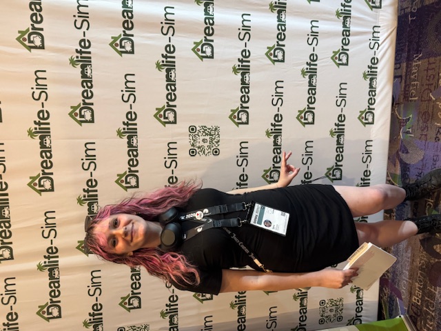Guest with Dreamlife-Sim™ branded backdrop